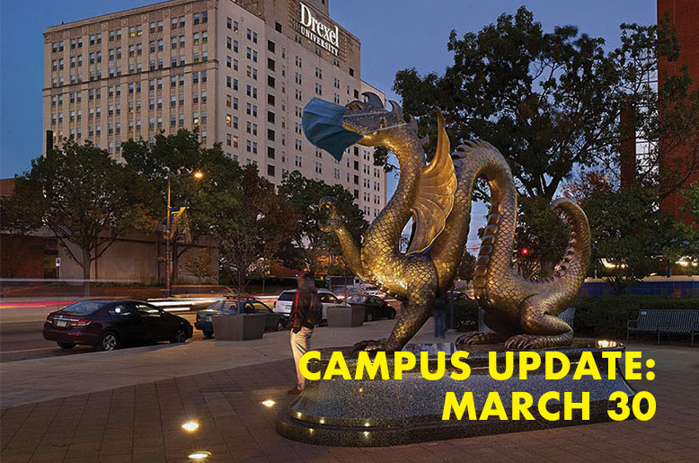 Dragon statue with the text campus update March 30